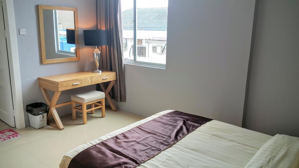 Residence 21 Boutique Inn Miri Esterno foto